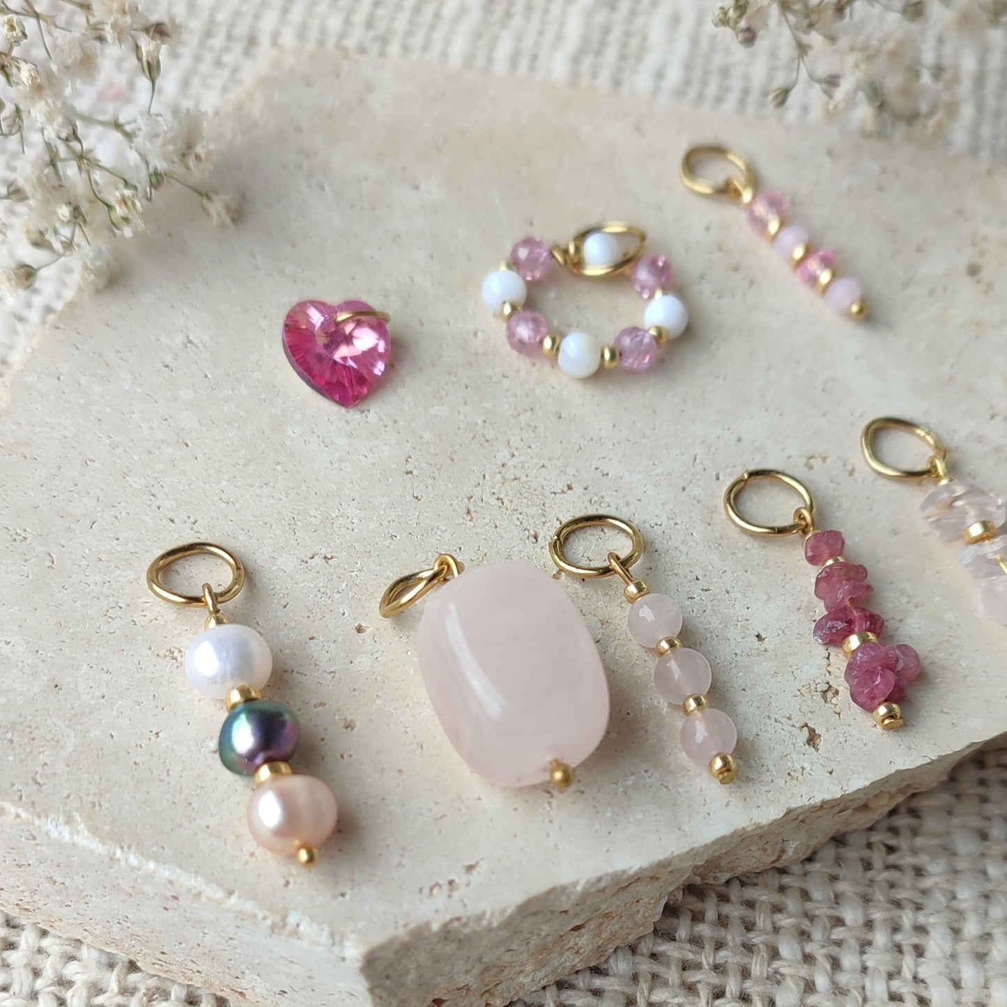 Nos charms , tons roses / création